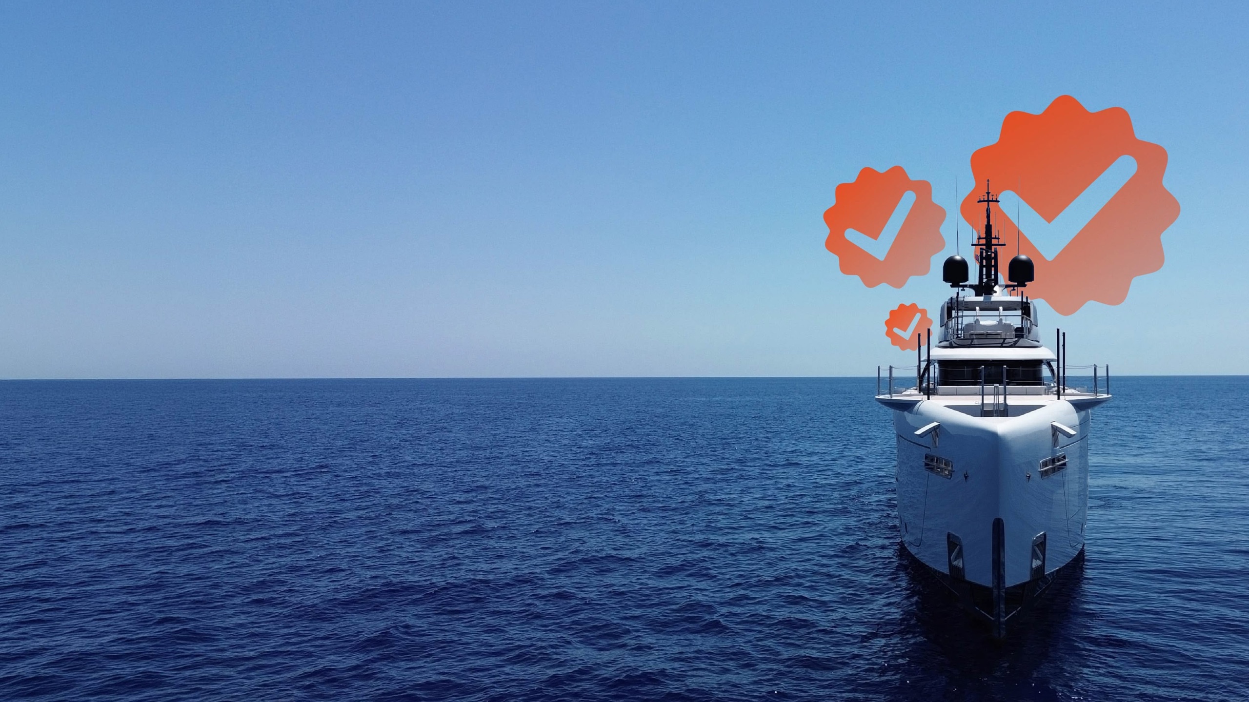 A superyacht bow on open water