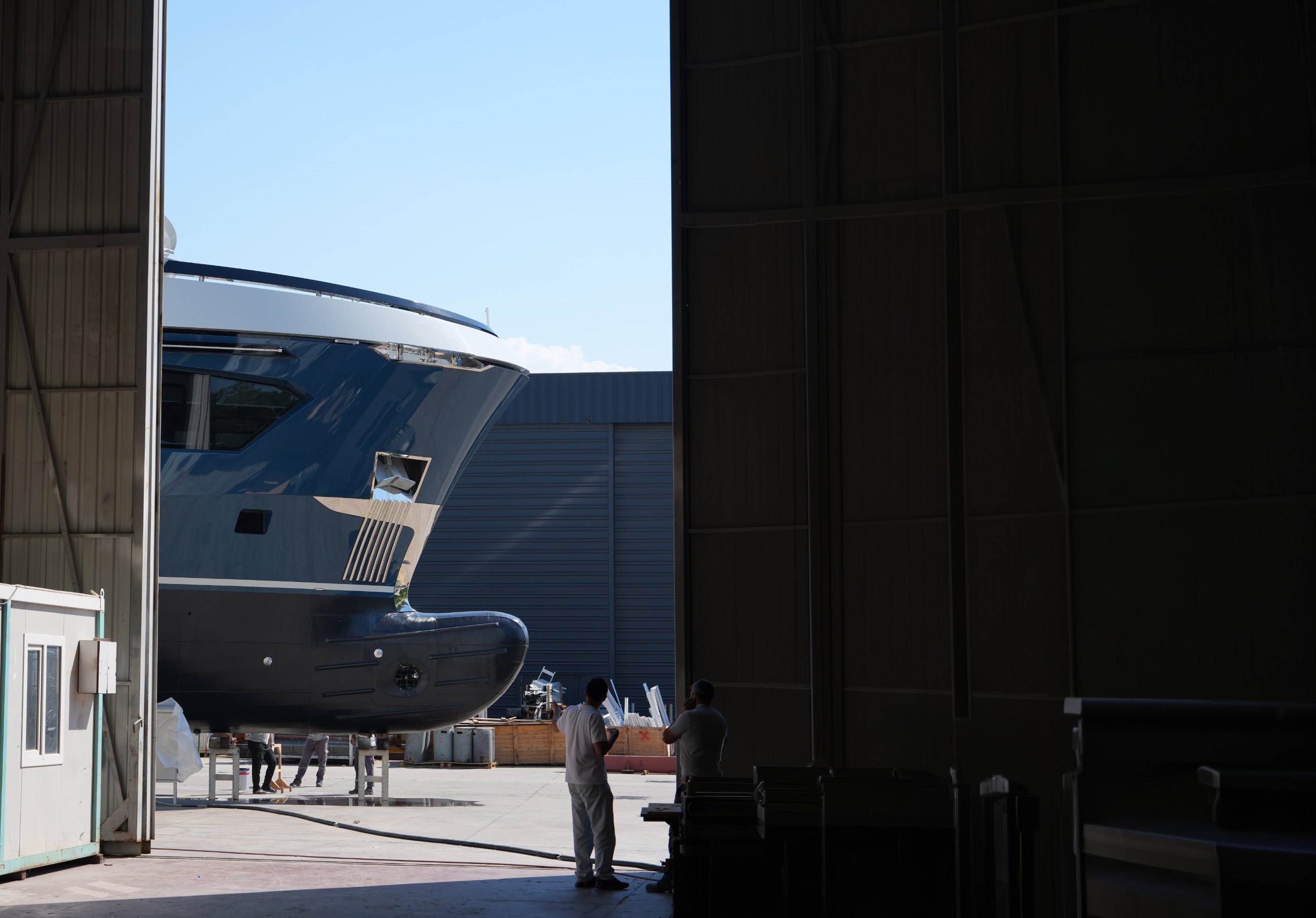 A yacht in a Monaco shipyard shed